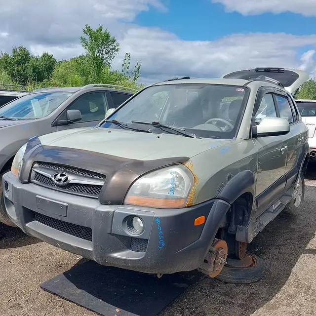 HYUNDAI Tucson 2009 — Côté gauche