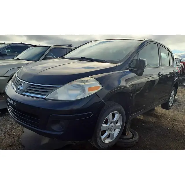 NISSAN Versa 2009 — Left side