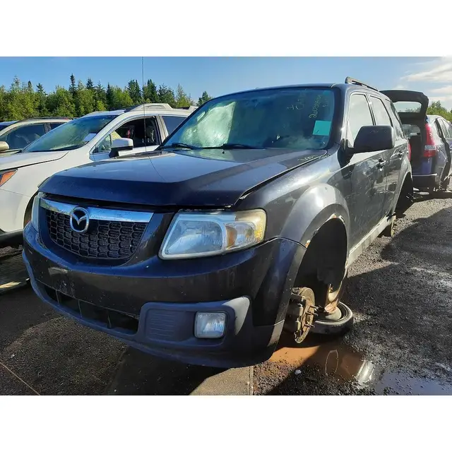 MAZDA Tribute 2011 — Côté gauche