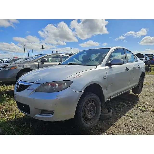 MAZDA Mazda3 2008 — Côté gauche