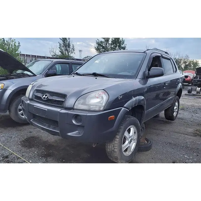 HYUNDAI Tucson 2008 — Left side