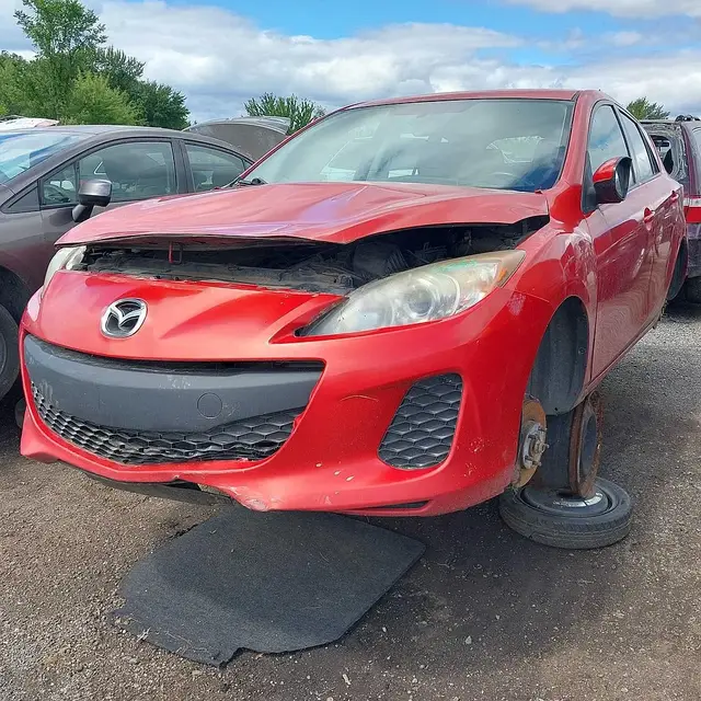MAZDA Mazda3 2012 — Côté gauche