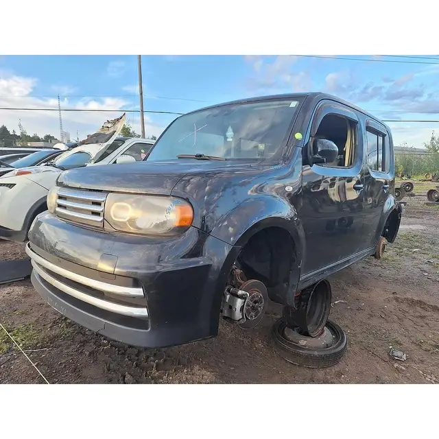NISSAN Cube 2010 — Côté gauche