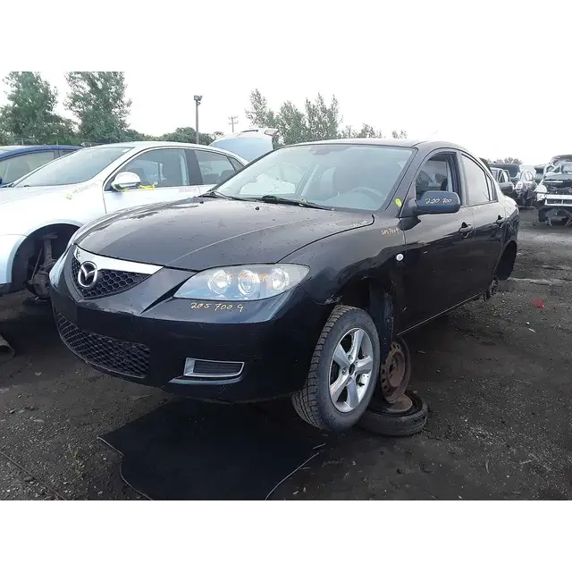MAZDA Mazda3 2009 — Left side