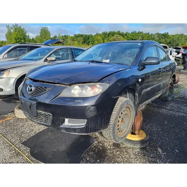MAZDA Mazda3 2008 — Côté gauche
