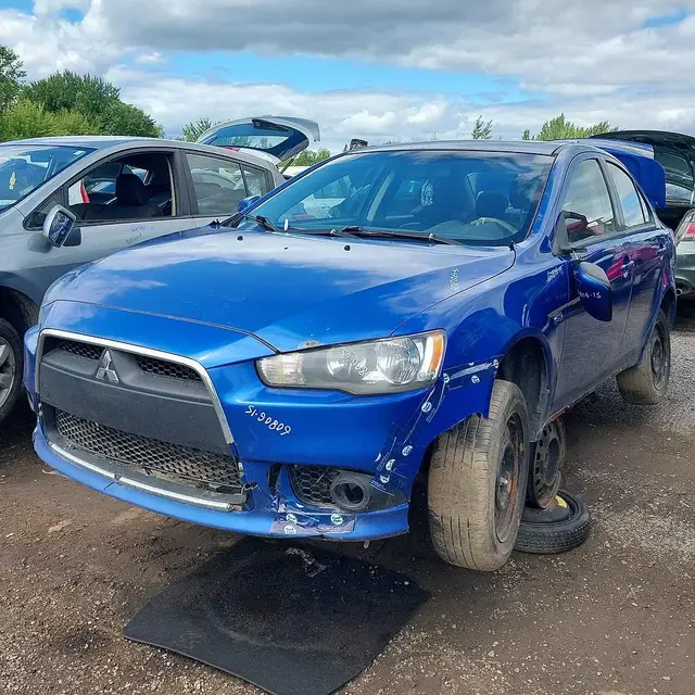 MITSUBISHI Lancer 2015 — Côté gauche