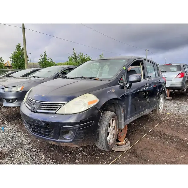 NISSAN Versa 2009 — Left side