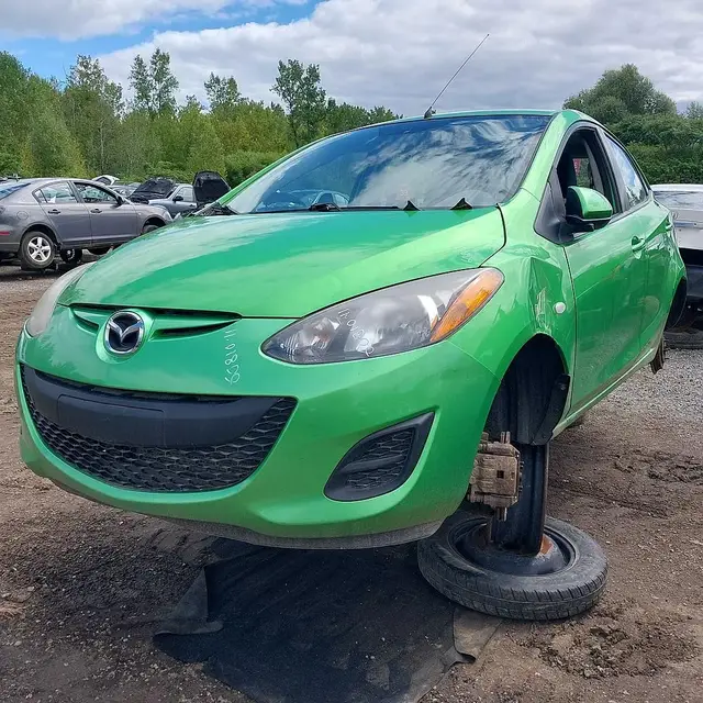 MAZDA Mazda2 2011 — Left side