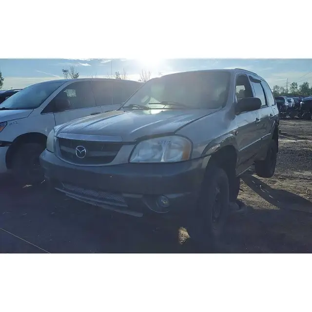 MAZDA Tribute 2002 — Left side